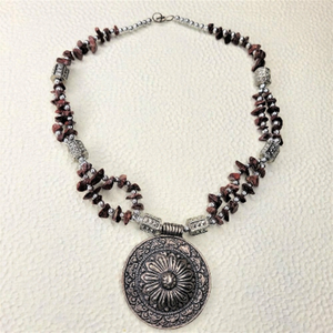 Brown Shell and Tubular Silver Tone Bead Necklace with Large Round Pendant